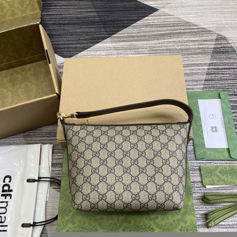 G*u*i top handle bags